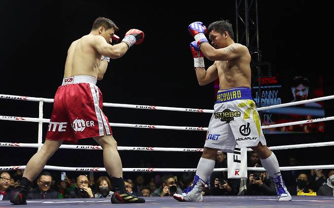 웰바이오텍이 투자한 매니 파키아오와 DK 유의 스페셜 매치가 지난 2022년 12월 열렸다.[사진｜연합뉴스]