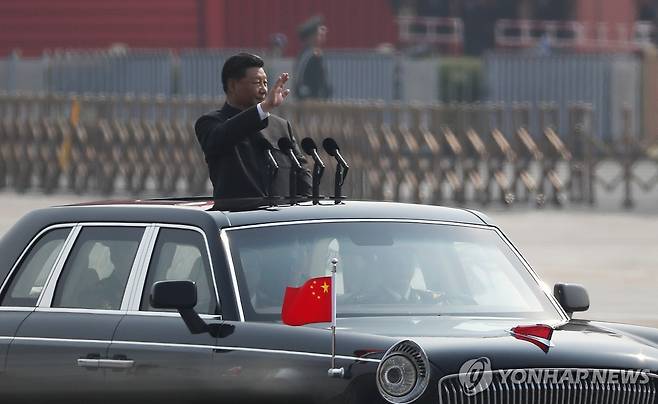 2019년 중국 건국 70주년 기념 열병식에서 군을 사열하는 시진핑 중국 국가주석 [EPA 연합뉴스 자료사진. 재판매 및 DB 금지]