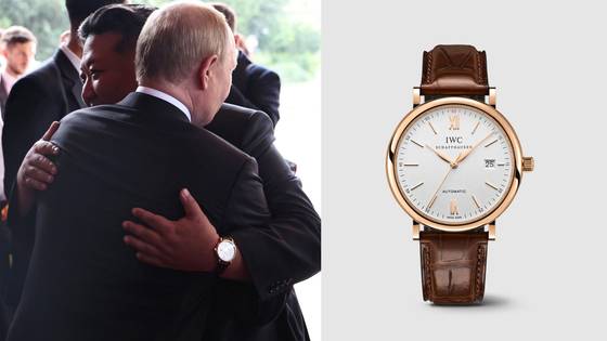 This composite photo shows North Korean leader Kim Jong-un embracing Russian President Vladimir Putin during a visit to Beijing on Sept. 3, left, and the IWC Schaffhausen Portofino Automatic wristwatch Kim wore. [YONHAP/SCREEN CAPTURE]