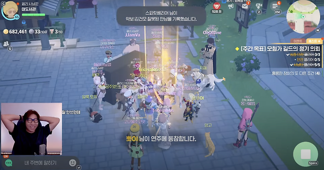 This image from the YouTube channel “Buzzbean11" shows Na Dong-hyeon live-streaming himself playing the mobile game Mabinogi, with his face appearing in a box on the left. (Screenshot from YouTube channel Buzzbean11)