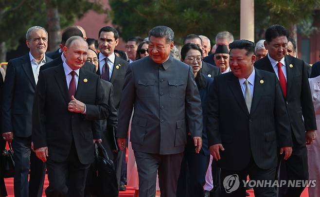 중국 전승절 80주년 열병식서 만난 북중러 정상 [UPI 연합뉴스 자료사진. 재판매 및 DB 금지]