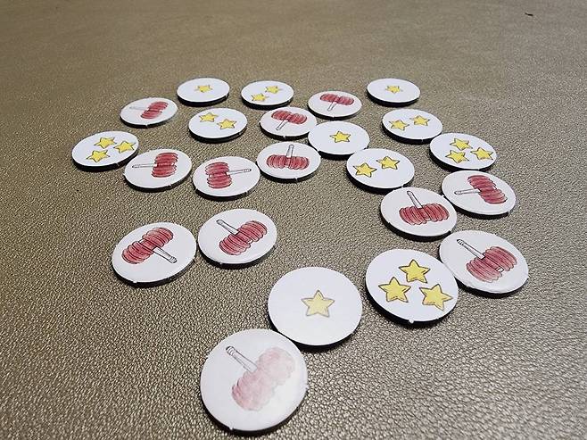 토큰. 뽕망치 모양이 뒷면이다