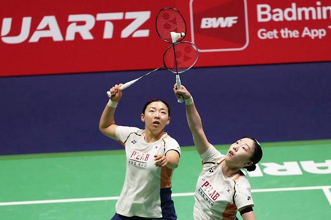 공희용(왼쪽)과 김혜정.    AFP연합뉴스