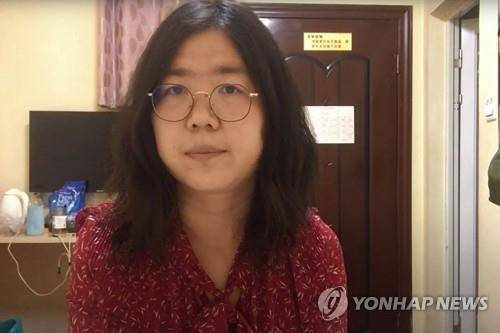 '우한 실상 폭로' 중국 시민기자 장잔 [AFP 연합뉴스 자료사진. 재판매 및 DB 금지]