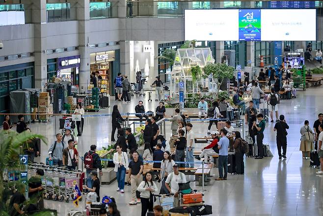 22일 인천국제공항 1터미널 입국장이 사람들로 붐비고 있다. 인천공항=뉴시스