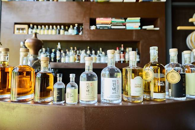 Liquors from Menge Craft Distillery line up on a table. [KORAIL TOURISM DEVELOPMENT]