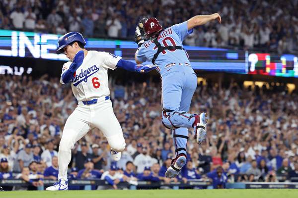 김혜성이 11회말 득점하고 있다. 사진= Getty Images/AFP= 연합뉴스 제공