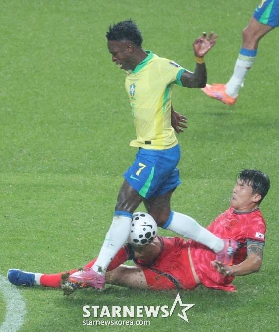 비니시우스 주니오르(위)와 김민재. /사진=김진경 대기자