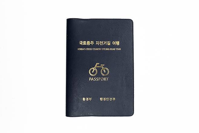 The Korea Cross Country Cycling Road Tour passport, which covers all official Korean bicycle paths.  [DANIELA GONZALEZ PEREZ]
