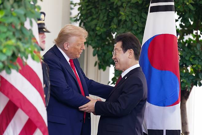 President Donald Trump greets President of Korea Lee Jae Myung outside the West Wing of the White House in Washington, DC on Monday, August 25, 2025. Trump blasted South Korea for political instability, foreshadowing a potentially rocky visit by the country's president to the White House to discuss its framework trade and investment agreement with the US.[UPI/YONHAP]