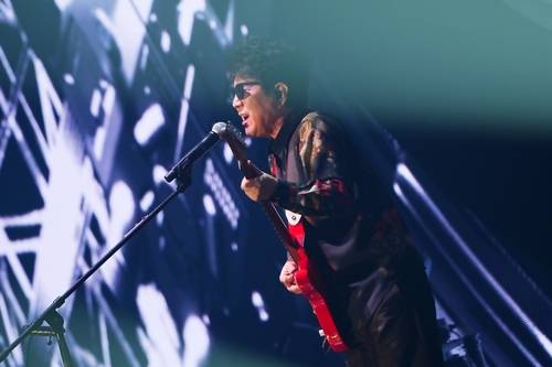 Cho Yong-pil performs at the KSPO Dome in Seoul Olympic Park on Nov. 23, 2024, during a concert celebrating the release of his 20th studio album. [YONHAP]