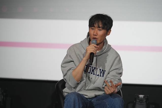 Webtoon artist Gwang Jin of  "Itaewon Class" talks during a talk show titled "From Itaewon to Roppongi, global <Itaewon Class>" on Tuesday at Lotte Cinema World Tower in Jamsil during the 2025 World Webtoon Festival. (KOCCA)