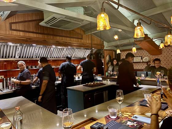 Interior of Papa's, a 12-seat, fine dining restaurant in Mumbai serving modern Indian dishes [LEE JIAN]