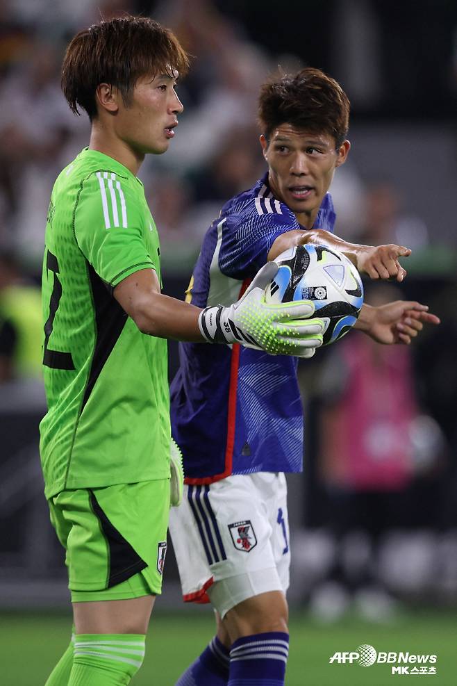 오사코 케이스케(사진 왼쪽). 사진=AFPBBNews=News1