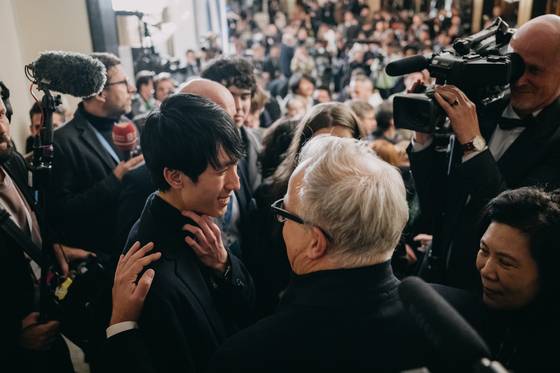 Pianist Eric Lu is seen after the announcement of results during the final stage of the 19th International Fryderyk Chopin Piano Competition at Warsaw Philharmonic Hall in Warsaw, Poland, on Oct. 21. [CHOPIN INSTITUTE]