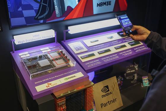 SK hynix's fifth-generation high bandwidth memory (HBM3E) is displayed at the chipmaker's booth for SK AI Summit held at Coex in Gangnam District, southern Seoul, on Nov. 3. [YONHAP]