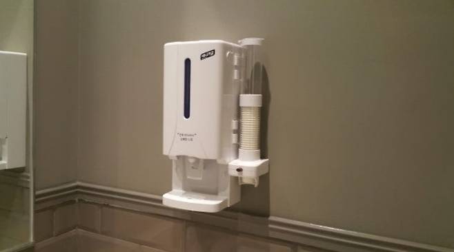 A family restroom at a department store in Pangyo, Gyeonggi Province, where a mouthwash dispenser is installed for public use.