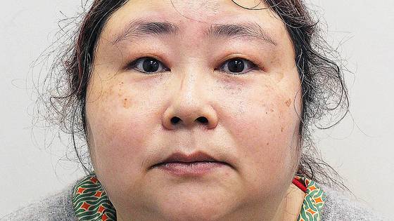 중국에서 13만여명을 상대로 사기 행각을 벌여 뜯어낸 돈을 영국에서 세탁한 혐의로 징역형을 선고받은 중국인 첸즈민. AFP=연합뉴스