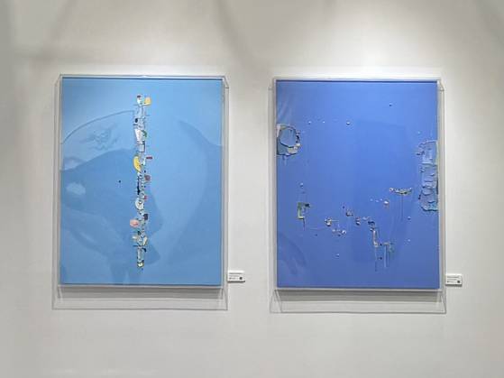 Two paintings by Kim Kwan-young under his ongoing series “The Memory of the Unconscious” exhibited at L Gallery’s Art Taipei booth [LEE JIAN]