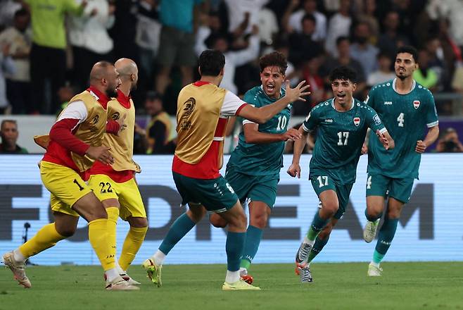 기뻐하는 이라크 선수들 | 로이터연합뉴스