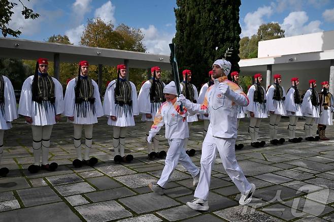 2026 밀라노·코르티나담페초 동계 올림픽 성화 채화식이 26일(현지시간) 그리스 올림피아에서 열렸다. ⓒ AFP=뉴스1