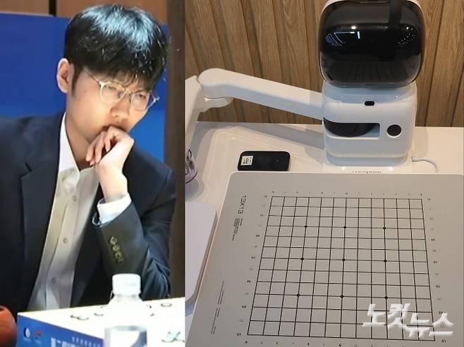 신진서 9단(사진 왼쪽)과 한국기원 신관에 설치된 바둑 인공지능 로봇. 동규기자·한국기원 제공