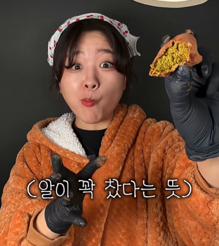 Screen capture from “Woman Who Eats 10 Dubai Chewy Cookies at a Time” by YouTuber Baby Pig Rabbit  (YouTube)