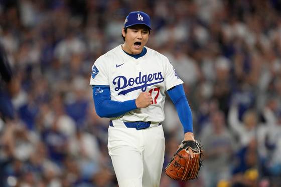 Los Angeles Dodgers pitcher Shohei Ohtani reacts during Game 4 of the National League Championship Series against the Milwaukee Brewers in Los Angeles on Oct. 17. [AP/YONHAP]