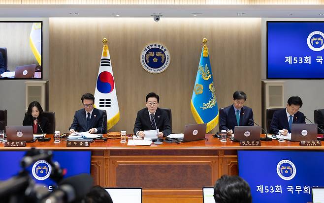 President Lee Jae Myung, center, speaks during a Cabinet meeting at the Yongsan presidential office in central Seoul on Dec. 9. [PRESIDENTIAL OFFICE]