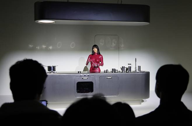 Bianca Censori, an architect and wife of American rapper Ye formerly known as Kanye West, presents her debut performance art piece, “Bio Pop (The Origin),” in eastern Seoul on Dec. 11. [NEWS1]
