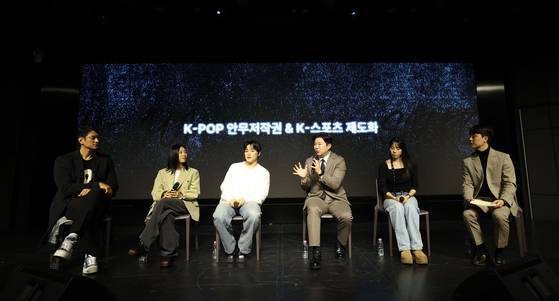 From left: former volleyball player Kim Yo-han; 1Million Dance Studio founder Lia Kim; K-pop choreographer Choi Young-jun; Rep. Jin Jong-oh; and former rhythmic gymnast Shin Soo-ji feature as panelists for “The 1st Move: The Next Stage” talk show hosted by Korea Choreography Copyright Association (KCCA) and Korean Sports Development Association held in western Seoul Dec. 4. [YONHAP]