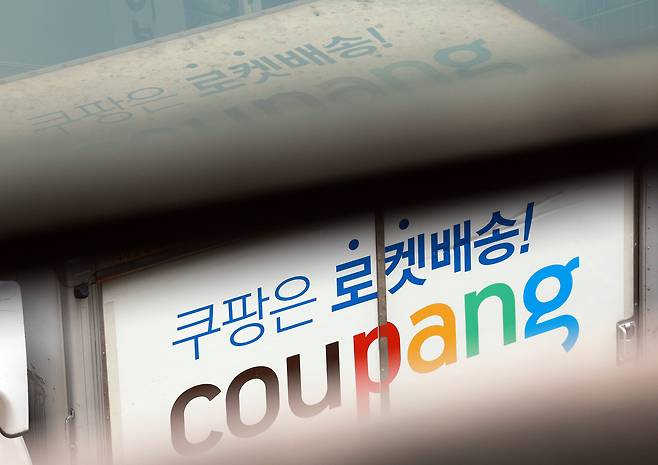 A Coupang delivery truck is parked at a logistics center in Seoul on Sunday. (Yonhap)