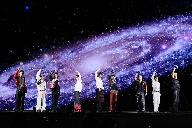 Boy band Seventeen performs during its latest concert “NEW_,” which kicked off at Incheon Asiad Main Stadium in Incheon with two shows on Sept. 13 and 14. [PLEDIS ENTERTAINMENT]