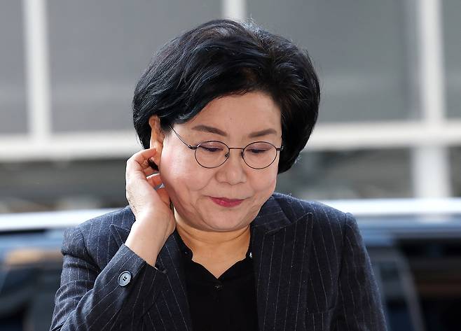 Lee Hye-hoon, a former People Power Party lawmaker, arrives at an office set up at the Korea Deposit Insurance Corporation in Jung District, central Seoul, on Dec. 30, 2025, to prepare for her confirmation hearing. [YONHAP]