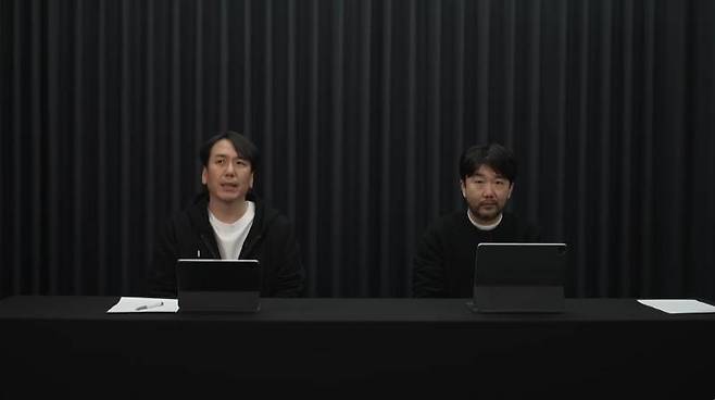 초췌한 모습으로 사과 방송을 진행 중인 소인섭 사업실장과 김남준 PD_출처 엔씨소프트