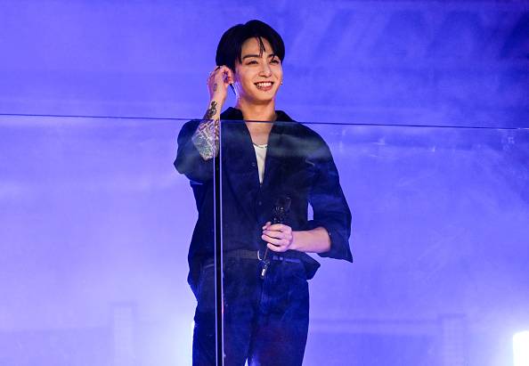 Jungkook performs a surprise concert in Times Square on Nov. 9, 2023, in New York. (Getty Images)