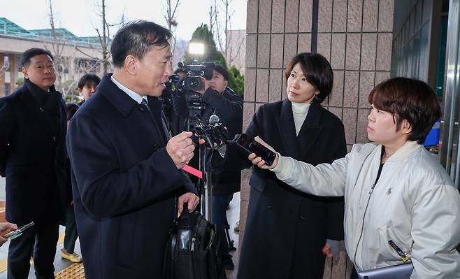 Kim Jong-cheol, newly appointed chair of the Korea Media Communications Commission, speaks to reporters on his first day at work at the government complex in Gwacheon, Gyeonggi, on Dec. 19, 2025. [NEWS1]