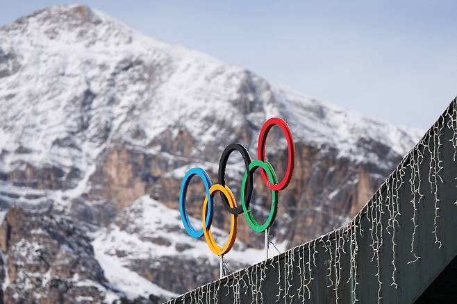 A general view shows the Olympic rings on the Cortina Curling Olympic Stadium, which will host the curling and wheelchair curling events as well as the Paralympic closing ceremony during the Milano-Cortina Winter Olympic Games 2026, in Cortina, Italy on Jan. 25. [REUTERS/YONHAP]