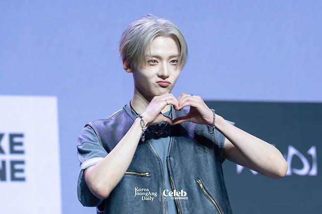 Alpha Drive One’s Sangwon poses for photos during a showcase for the release of the group’s first EP, ″Euphoria,″ at Blue Square in central Seoul on Jan. 12. [DANIELA GONZALEZ PEREZ]