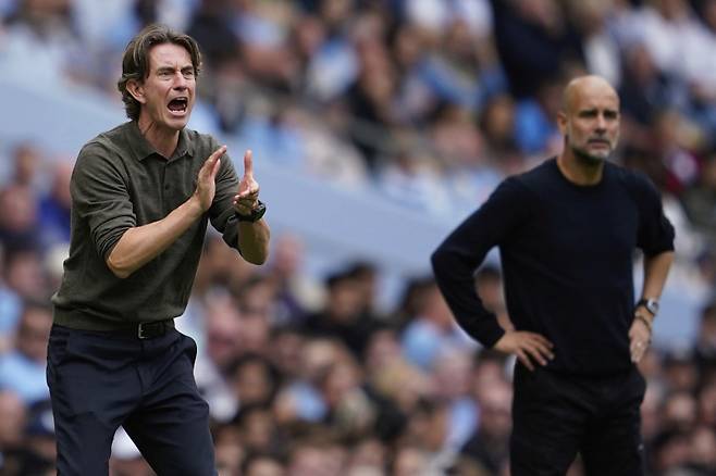 토마스 프랭크(왼쪽) 토트넘 감독과 펩 과르디올라 맨시티 감독. 사진=AP 연합뉴스