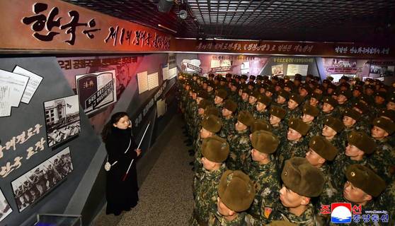 Young students of the Socialist Patriotic Youth League are seen during a tour of the Central Class Education House in Pyongyang, in this photo released by the Korean Central News Agency on Jan. 19. [KOREAN CENTRAL NEWS AGENCY]