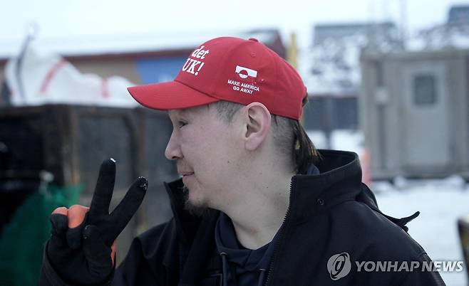 '미국 물러가라' 모자를 쓴 시위 참가자 [AFP=연합뉴스. 재판매 및 DB 금지]