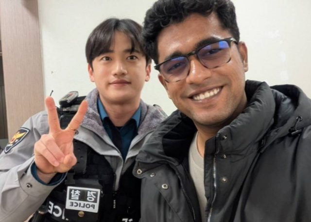 김재록 순경과 라만 빈 타즈워씨. 전북경찰청 제공