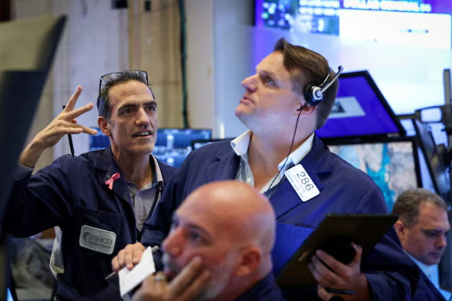 미국 뉴욕증권거래소(NYSE) 트레이더들. 사진=로이터연합