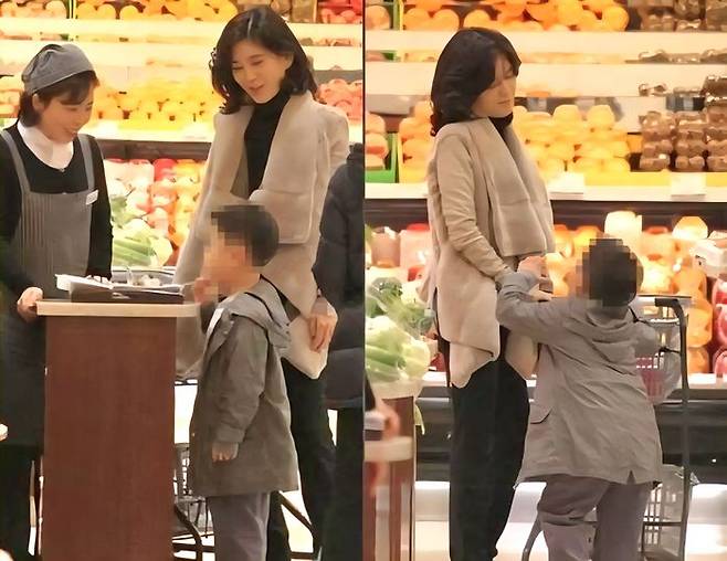 10여년 전 아들 임동현 군과 함께 백화점 쇼핑을 하고 있는 이부진 사장. ⓒ 호텔신라