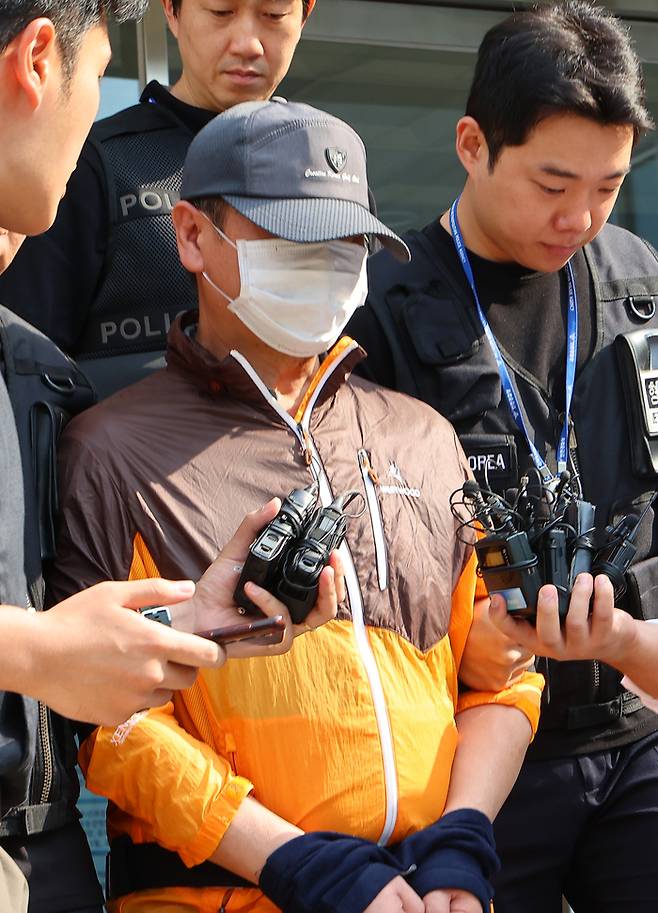 사제 총기로 아들을 살해한 60대 아버지. [연합뉴스]