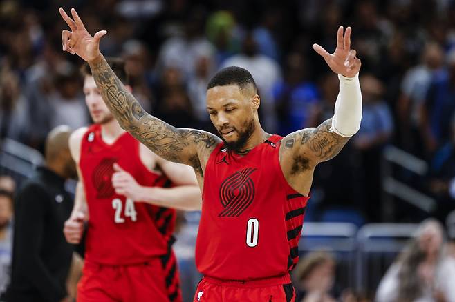 <yonhap photo-1819=""> FILE - Portland Trail Blazers guard Damian Lillard (0) celebrates after a shot against the Orlando Magic during the second half of an NBA basketball game, March 5, 2023, in Orlando, Fla. (AP Photo/Kevin Kolczynski, File) FILE PHOTO/2025-07-18 08:17:13/ <저작권자 ⓒ 1980~2025 ㈜연합뉴스. 무단 전재 재배포 금지, AI 학습 및 활용 금지></yonhap>