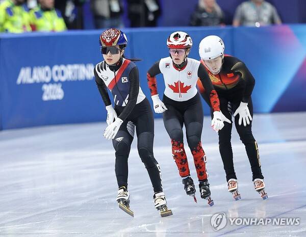 킴부탱보다 앞서 결승선을 통과하는 김길리. ⓒ연합뉴스