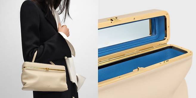 셀린느 이스트 웨스트 트리옹프 프레임 백은 가로로 긴 실루엣이 돋보인다. 가방을 열면 대조적인 컬러를 갖춘 수납 공간이 드러난다. 사진 셀린느