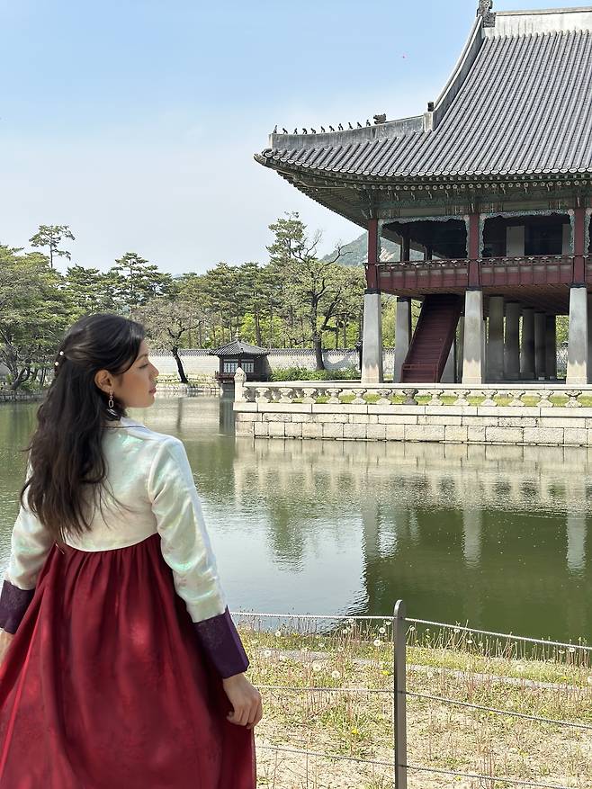 Angela Nario Villanueva poses for a photo at Gyeonghoeru Pavilion at Gyeongbokgung Palace in Seoul. (Angela Nario Villanueva)